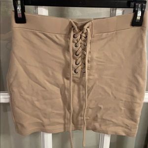 Tan lace up mini skirt